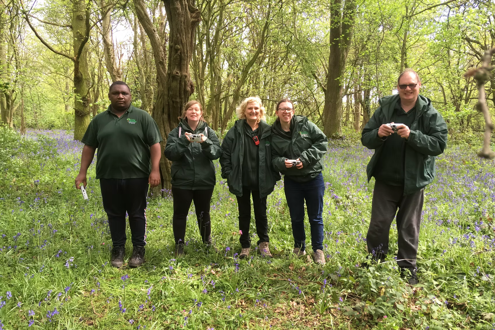 Imagery of members foraging in the woods